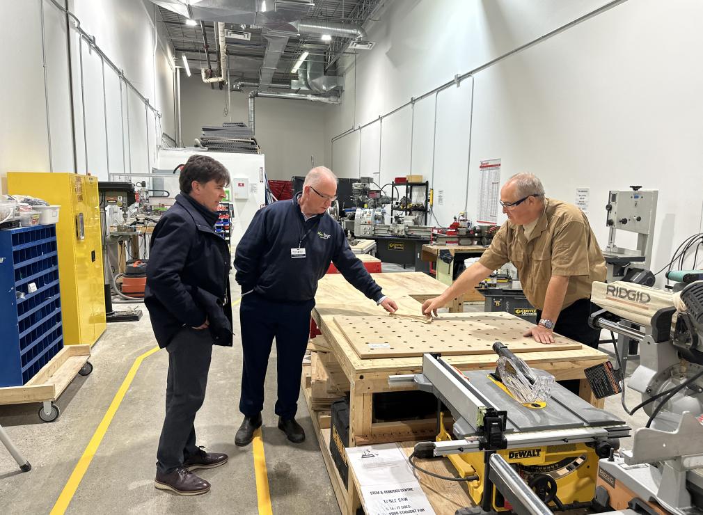 Technicians discussing work in an industrial building
